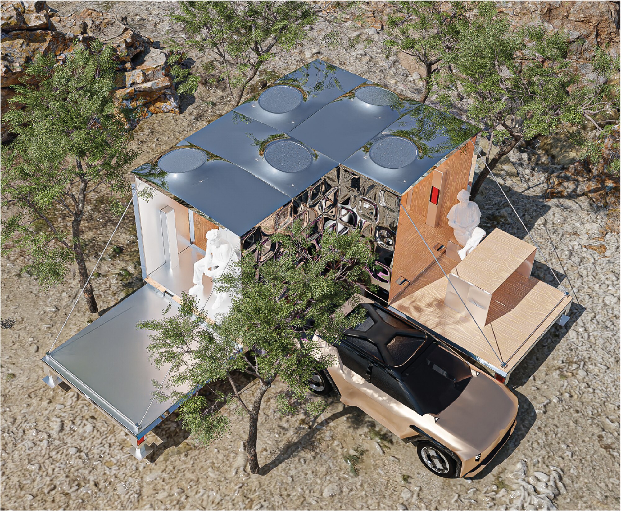 Aerial view of the BMW mobility pavilion opened into a fold-out camper structure in a desert landscape