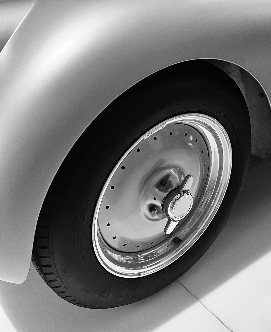Close detail of a classic BMW fender and wheel