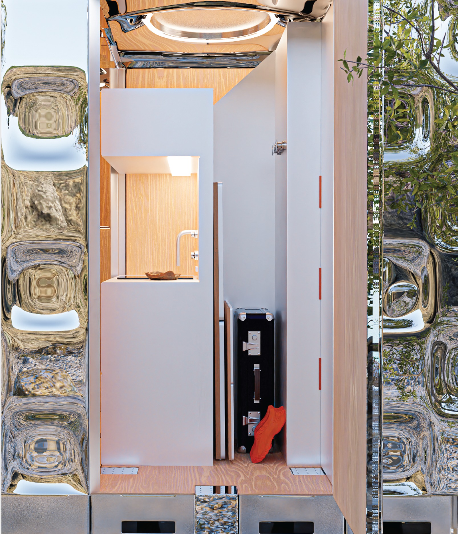 Interior view of the pod's kitchenette and wardrobe with mirrored ceiling reflections