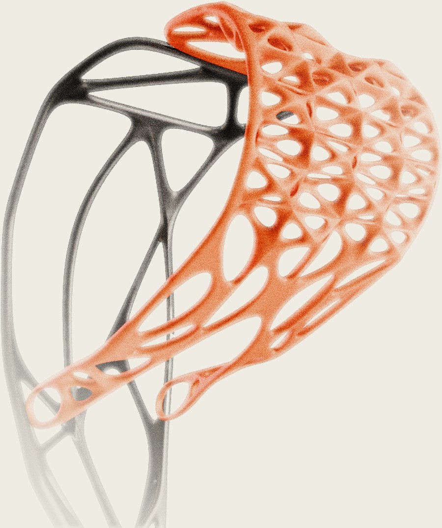 Close detail of the generative lattice wheel structure, orange accent overlay