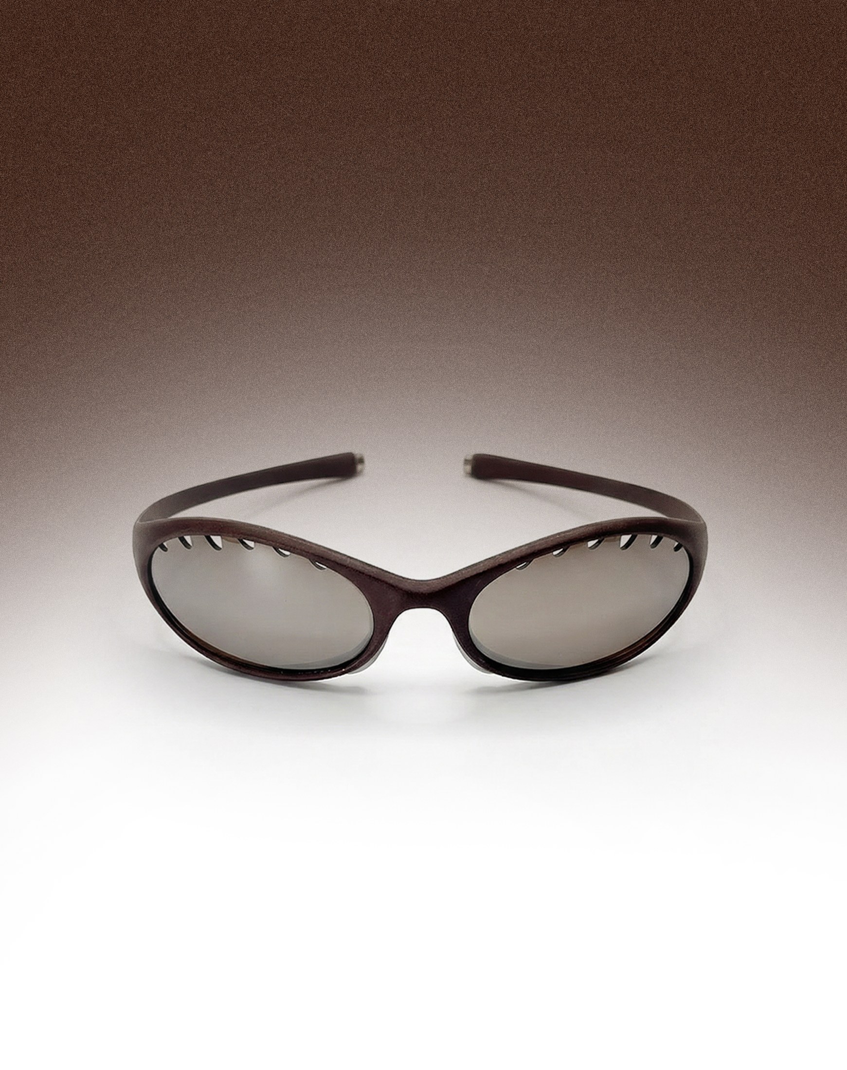 Front view of the frame with mirrored lenses, dark gradient studio background