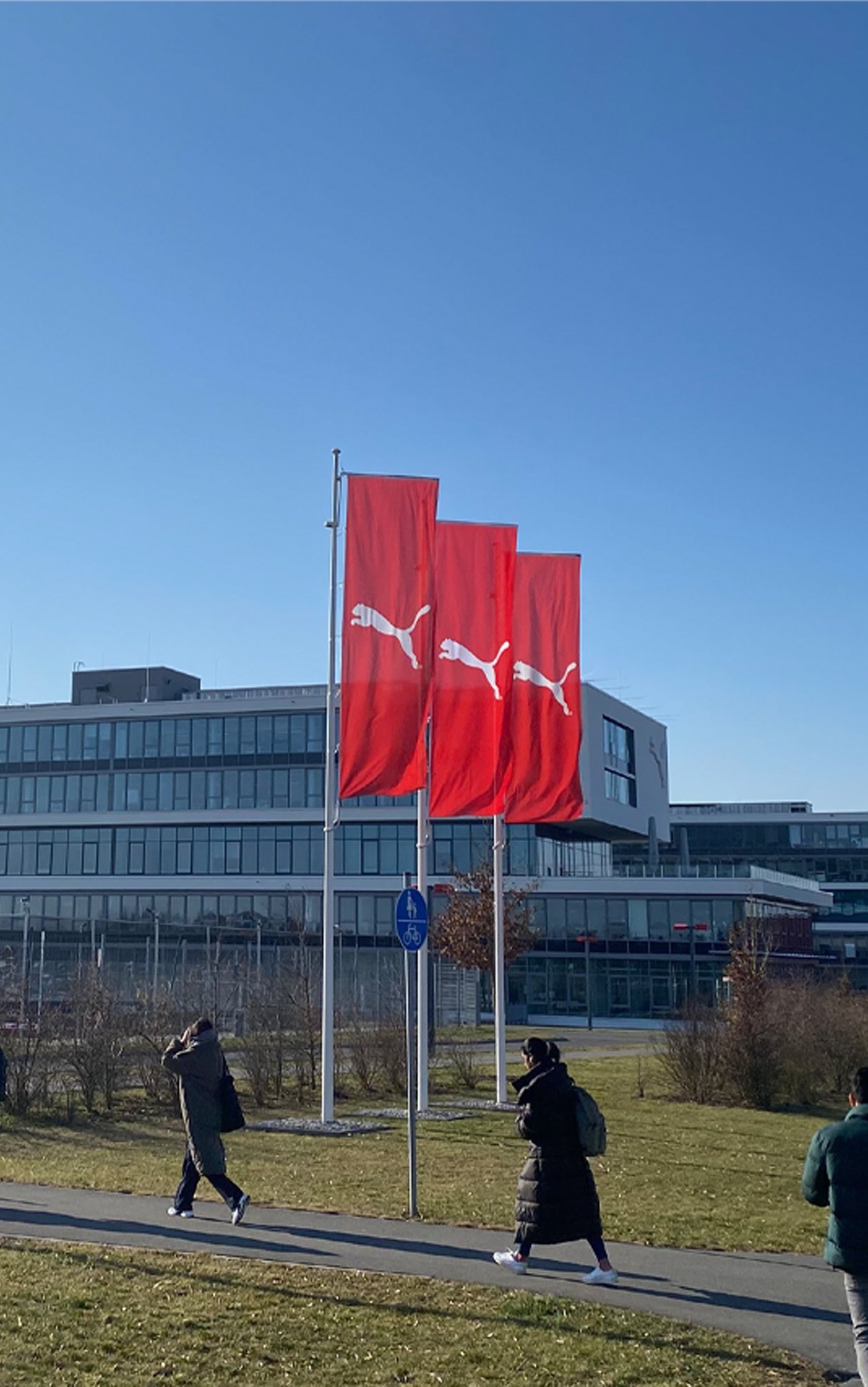 PUMA flags outside the PUMA headquarters building